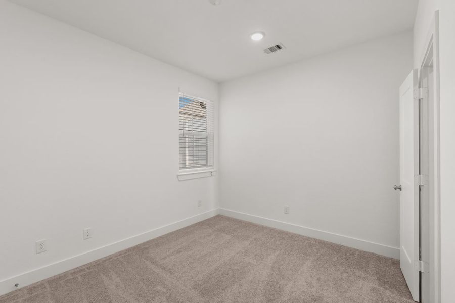 Representative unfurnished interior of a home built from the Cheverny by Chesmar Homes in Sienna Chateau, Missouri City (Image 24).