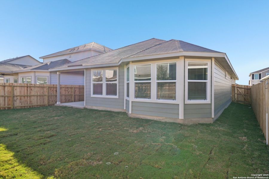 Exterior details and patio area of a home in Estancia Ranch - Premier Series, San Antonio (Image 4). Exterior details and patio area of a home in Estancia Ranch - Premier Series, San Antonio (Image 4).