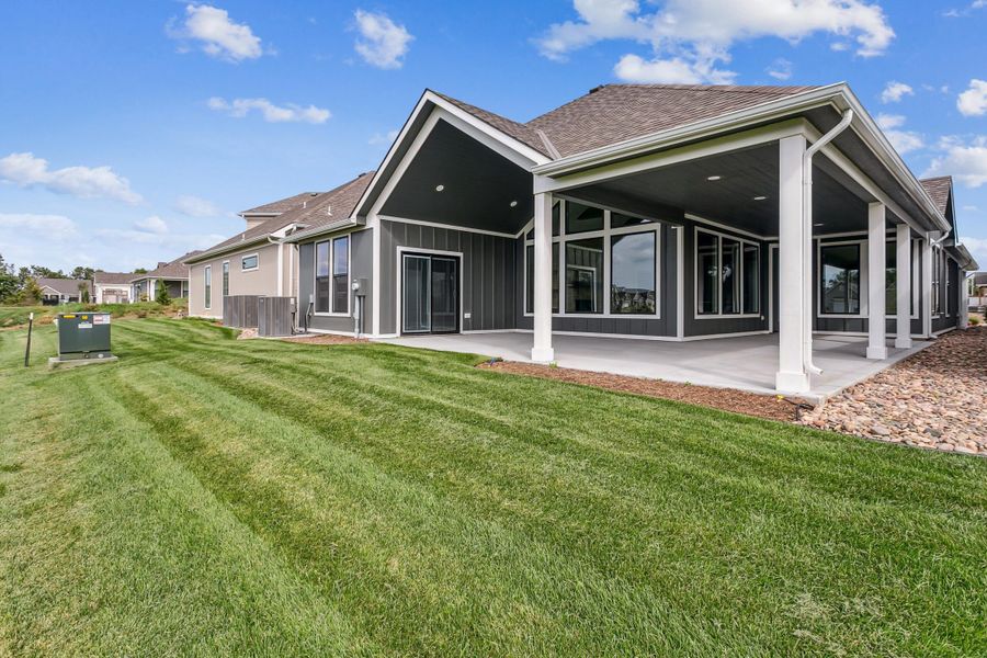 Exterior details and patio area of a home in The Courtyards at The Heritage, Andover (Image 16).