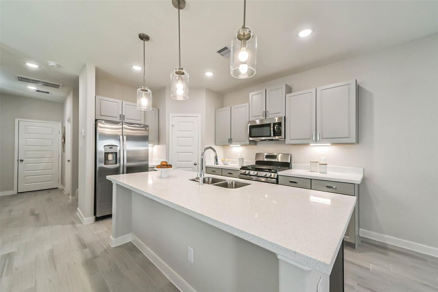 Photos are sample images from a previously built home with the same floor plan. Finishes and fixtures in the current home have been upgraded and may vary. Photos are sample images from a previously built home with the same floor plan. Finishes and fixtures in the current home have been upgraded and may vary.