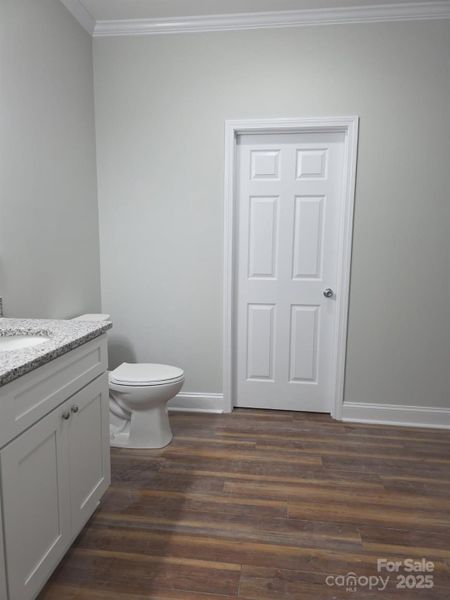 Ensuite bathroom with double vanity and large walk in closet