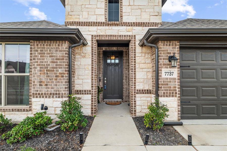 Exterior details and patio area of a home in Silo Mills - Select Series, Joshua (Image 4).