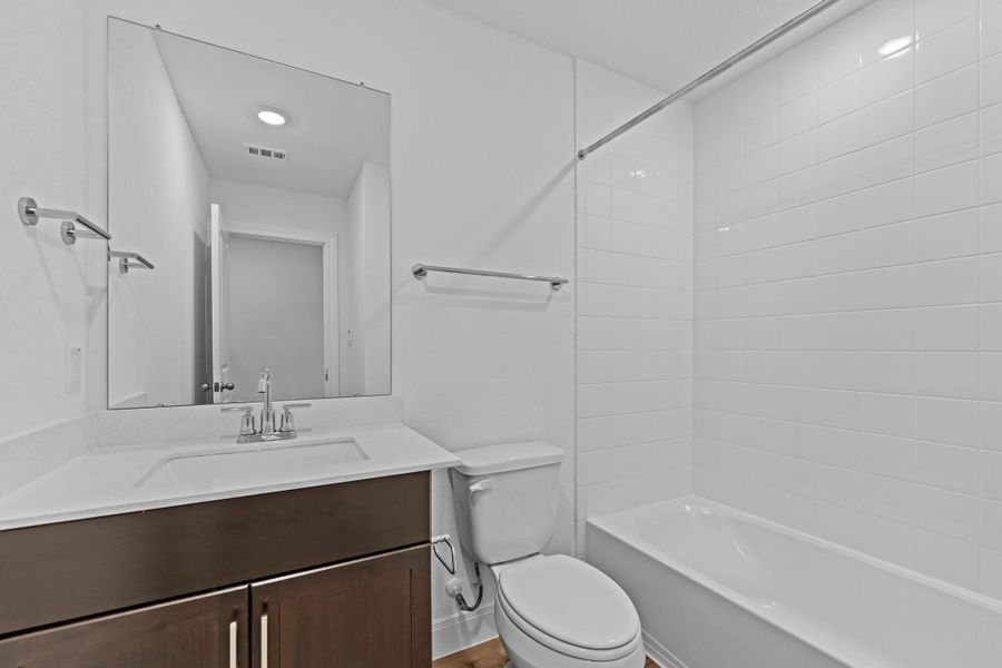 Furnished interior view inside a new home in Railhead, Cedar Creek (Image 9).