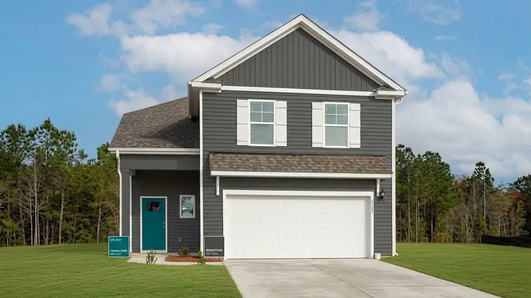 Front exterior of a new home in Vineyard Trail, Jacksonville, NC, highlighting curb appeal (Image 1). Front exterior of a new home in Vineyard Trail, Jacksonville, NC, highlighting curb appeal (Image 1).