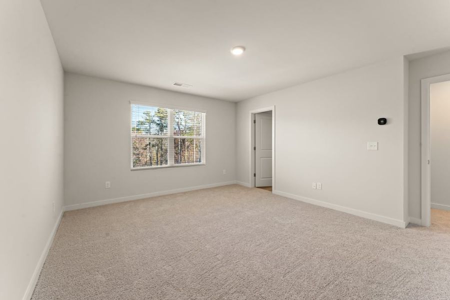 A room with a window and a door. A room with a window and a door.