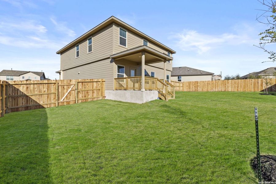 Exterior details and patio area of a home in Redbird Ranch, San Antonio (Image 2).