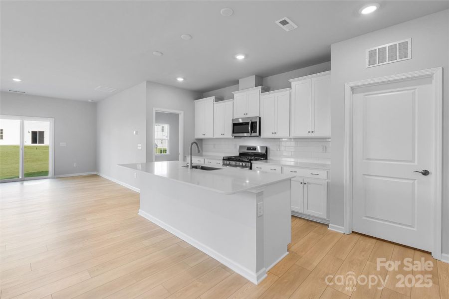 Furnished interior view inside a new home in Redhawk: Walk, Belmont (Image 10).