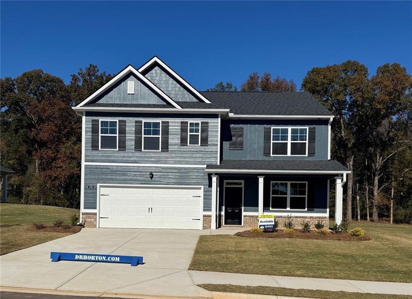 Front exterior of a new home in Jackson Landing, Jefferson, GA, highlighting curb appeal (Image 1).