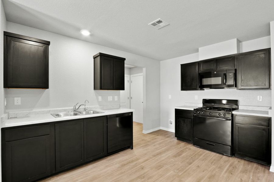 Furnished interior view inside a new home in Rancho Desierto Bello, Horizon City (Image 15).