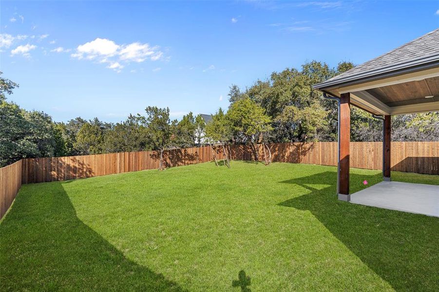 View of yard with a patio