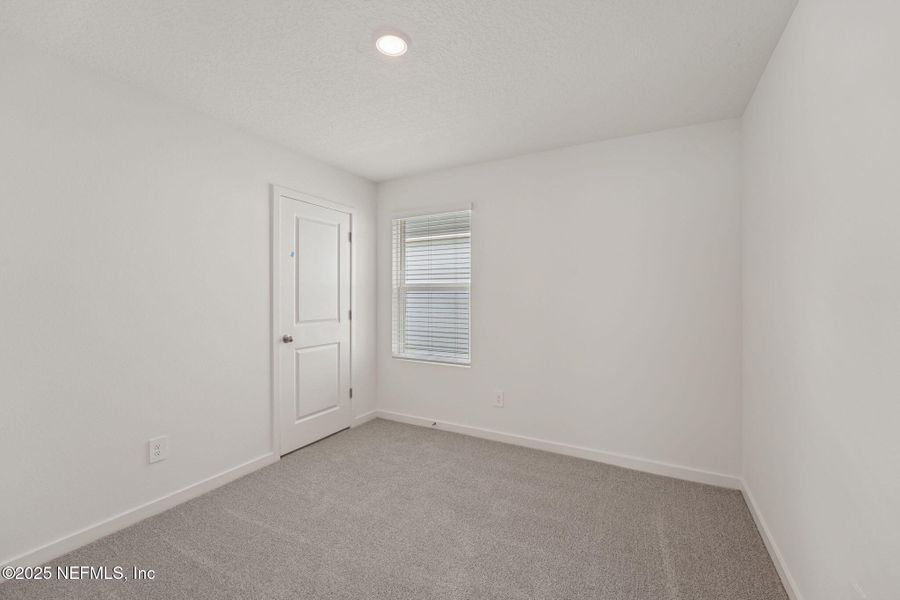 Spacious, unfurnished interior of a new home in Flagler Village - Classic Series, Palm Coast (Image 38). Spacious, unfurnished interior of a new home in Flagler Village - Classic Series, Palm Coast (Image 38).