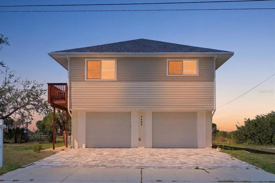 Front exterior of a new home in , Hernando Beach, FL, highlighting curb appeal (Image 23).