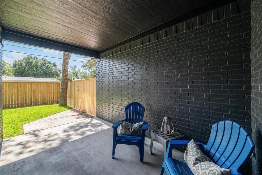 Fenced backyard with a patio Fenced backyard with a patio
