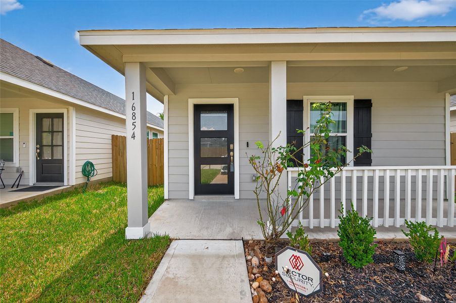 Front exterior of a new home in , Conroe, TX, highlighting curb appeal (Image 1). Front exterior of a new home in , Conroe, TX, highlighting curb appeal (Image 1).