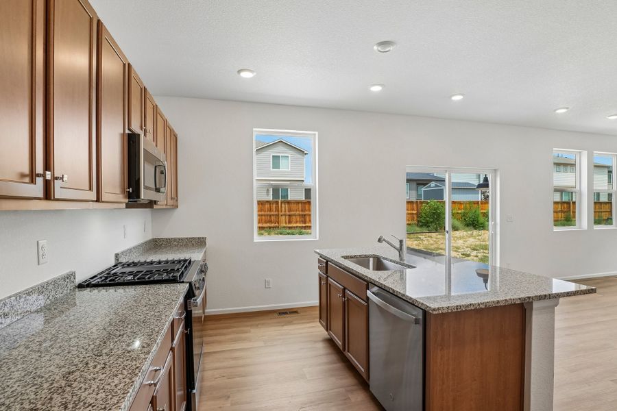 Furnished interior view inside a new home in The Cottages Collection at Ridgeline Vista, Brighton (Image 7).