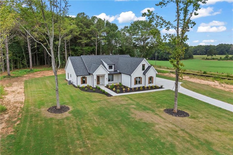 Front exterior of a new home in , Covington, GA, highlighting curb appeal (Image 33).