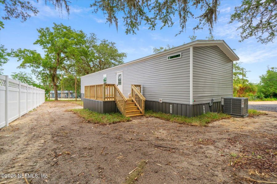 Exterior details and patio area of a home in , Satsuma (Image 25). Exterior details and patio area of a home in , Satsuma (Image 25).