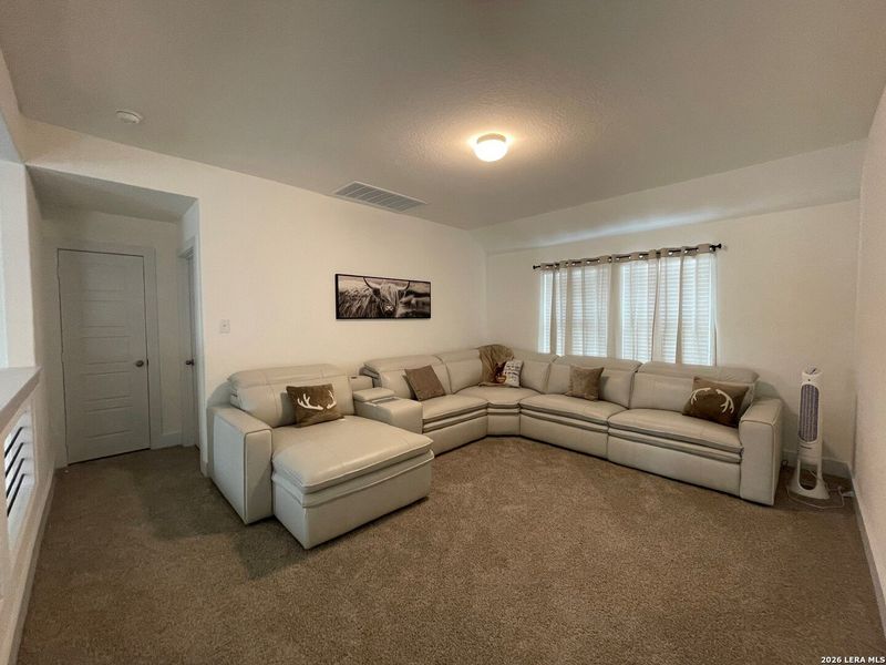 Furnished interior view inside a new home in Hunters Ranch, San Antonio (Image 6).