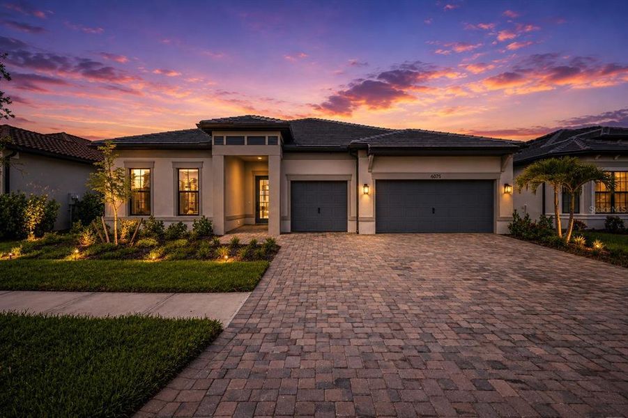 Front exterior of a new home in , Nokomis, FL, highlighting curb appeal (Image 1). Front exterior of a new home in , Nokomis, FL, highlighting curb appeal (Image 1).
