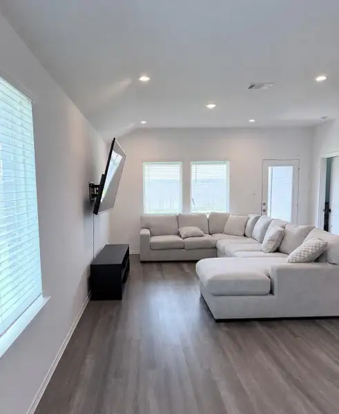 Furnished interior view inside a new home in Mill Creek, Magnolia (Image 2). Furnished interior view inside a new home in Mill Creek, Magnolia (Image 2).