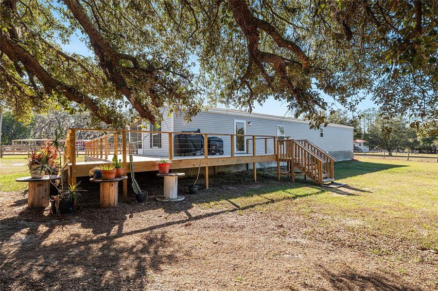 Exterior details and patio area of a home in , Weirsdale (Image 18).