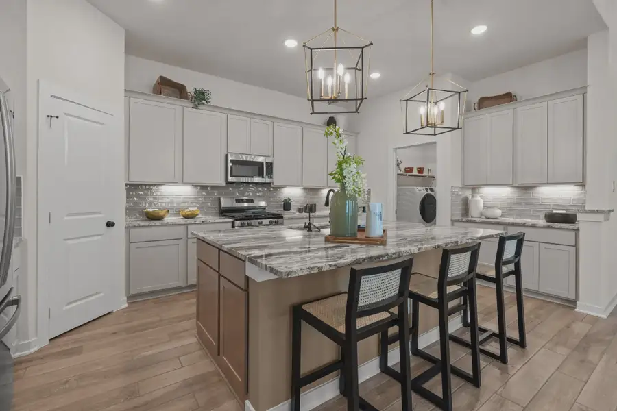 Representative furnished interior of a home built from the Tobias by Chesmar Homes in The Crossvine, Forney (Image 4).