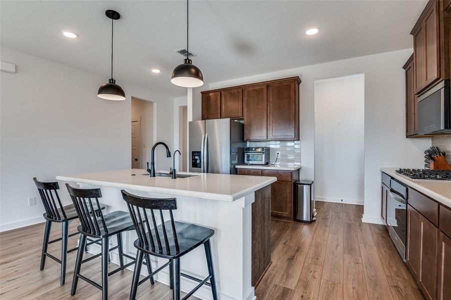 Furnished interior view inside a new home in Prairie Ridge at Goodland, Venus (Image 12).