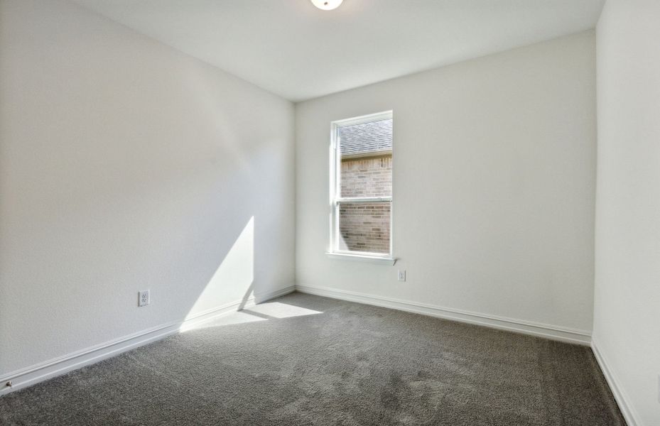 Spacious secondary bedroom with ample closet space