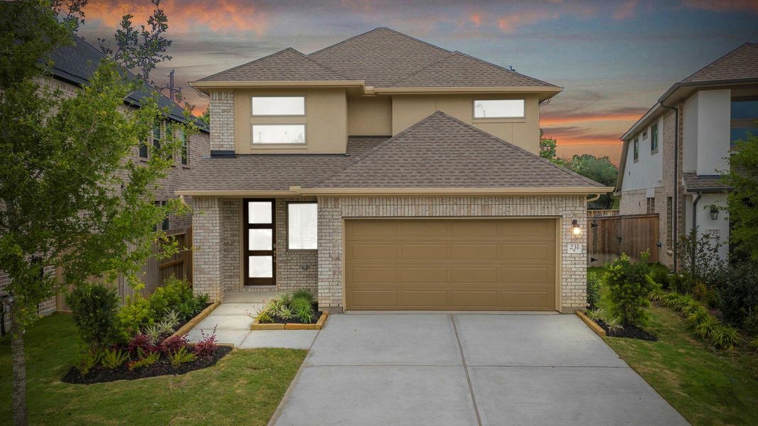 Front exterior of a new home in Candela, Richmond, TX, highlighting curb appeal (Image 23). Front exterior of a new home in Candela, Richmond, TX, highlighting curb appeal (Image 23).