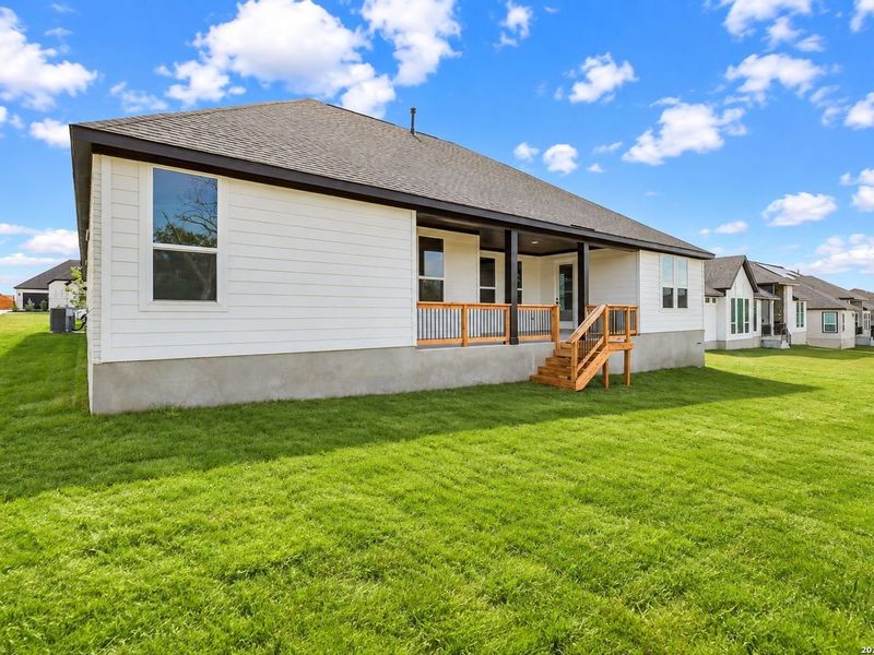 Exterior details and patio area of a home in Potranco Oaks, Castroville (Image 3).
