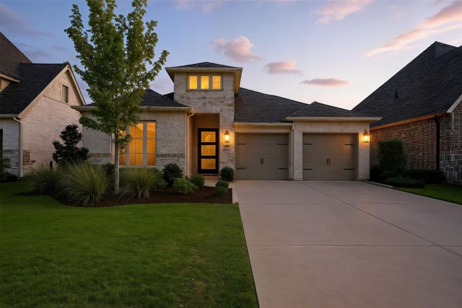Front exterior of a new home in Artavia 50', Conroe, TX, highlighting curb appeal (Image 18). Front exterior of a new home in Artavia 50', Conroe, TX, highlighting curb appeal (Image 18).