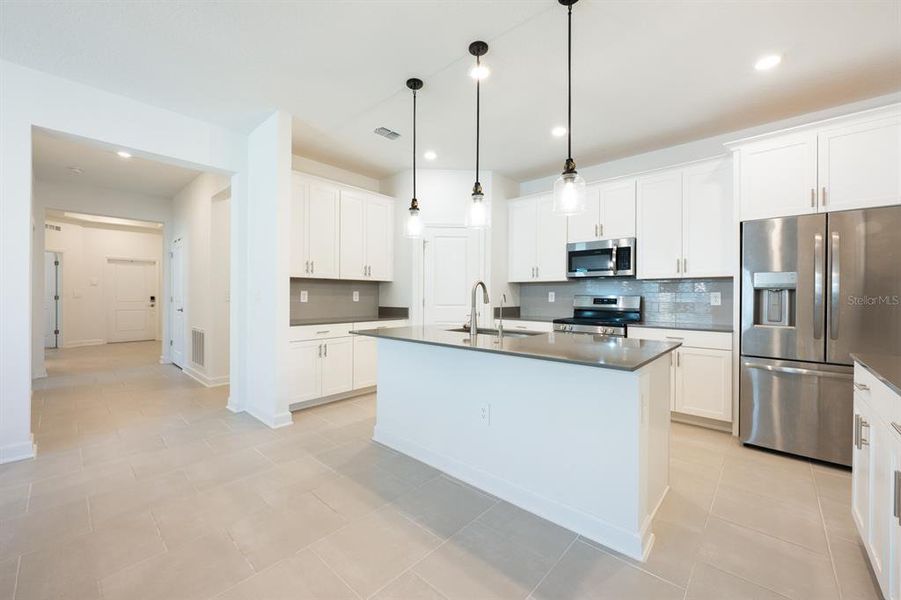Furnished interior view inside a new home in Tohoqua, Kissimmee (Image 9).