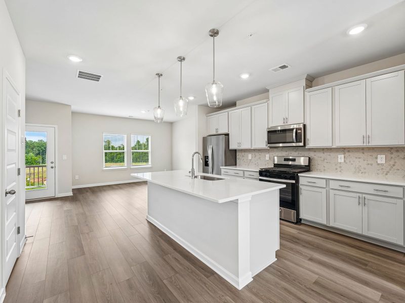 Furnished interior view inside a new home in Hemingway - Highland Series, Cumming (Image 6).