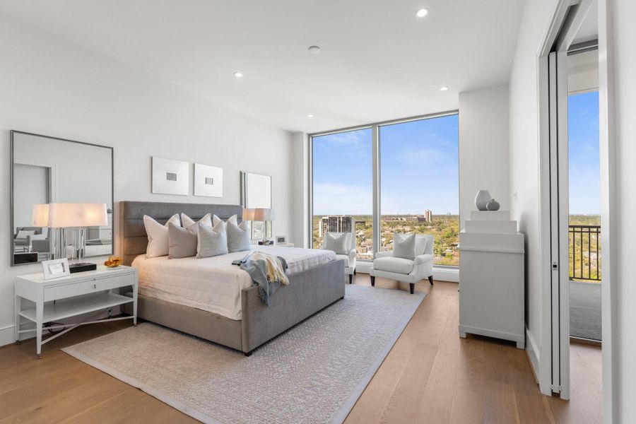 Stunning over-sized primary suite with His/Hers dressing rooms and wall of windows with spectacular Northern views Stunning over-sized primary suite with His/Hers dressing rooms and wall of windows with spectacular Northern views