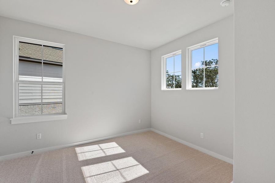 Spacious, unfurnished interior of a new home in Terrace Collection at Heritage, Dripping Springs (Image 23).