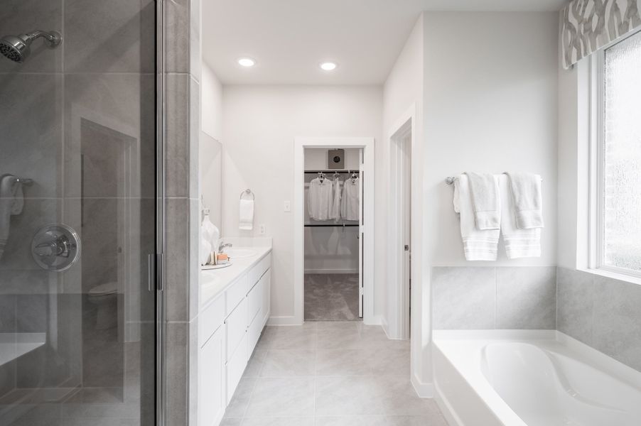 Representative furnished interior of a home built from the Caddo by Tri Pointe Homes in Mason Woods, Cypress (Image 9).