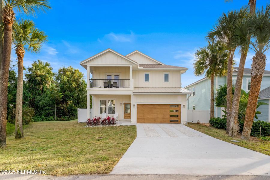Front exterior of a new home in , Jacksonville Beach, FL, highlighting curb appeal (Image 1). Front exterior of a new home in , Jacksonville Beach, FL, highlighting curb appeal (Image 1).