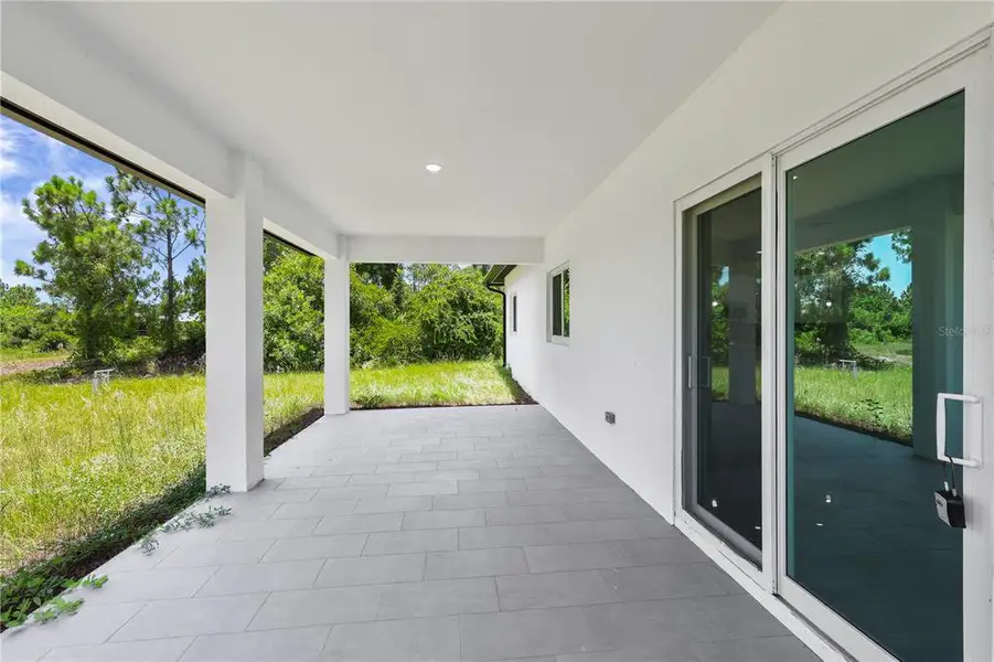 Exterior details and patio area of a home in , Lehigh Acres (Image 3). Exterior details and patio area of a home in , Lehigh Acres (Image 3).