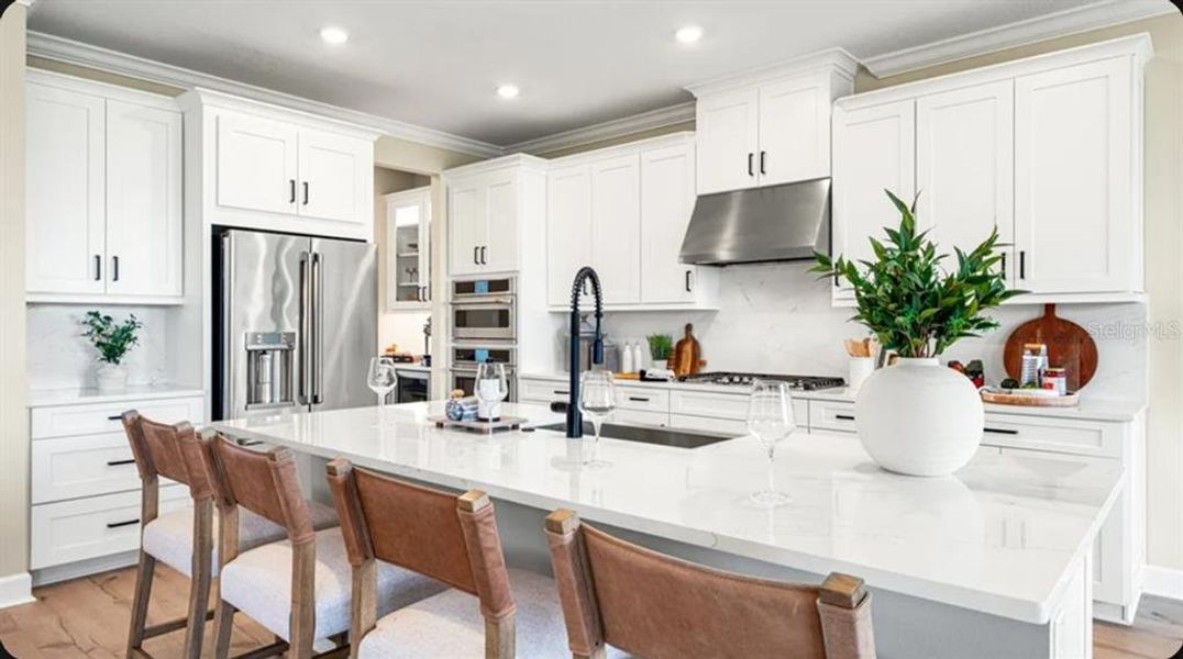 Furnished interior view inside a new home in Coasterra Community Group Page, Palmetto (Image 9).