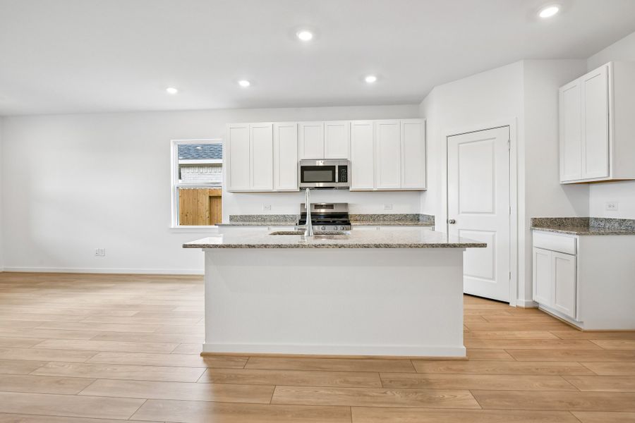 Furnished interior view inside a new home in Raburn Reserve 50s, Tomball (Image 5).