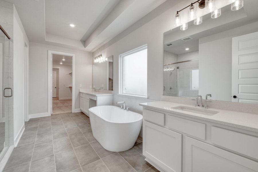 Furnished interior view inside a new home in The Colony, Bastrop (Image 11).