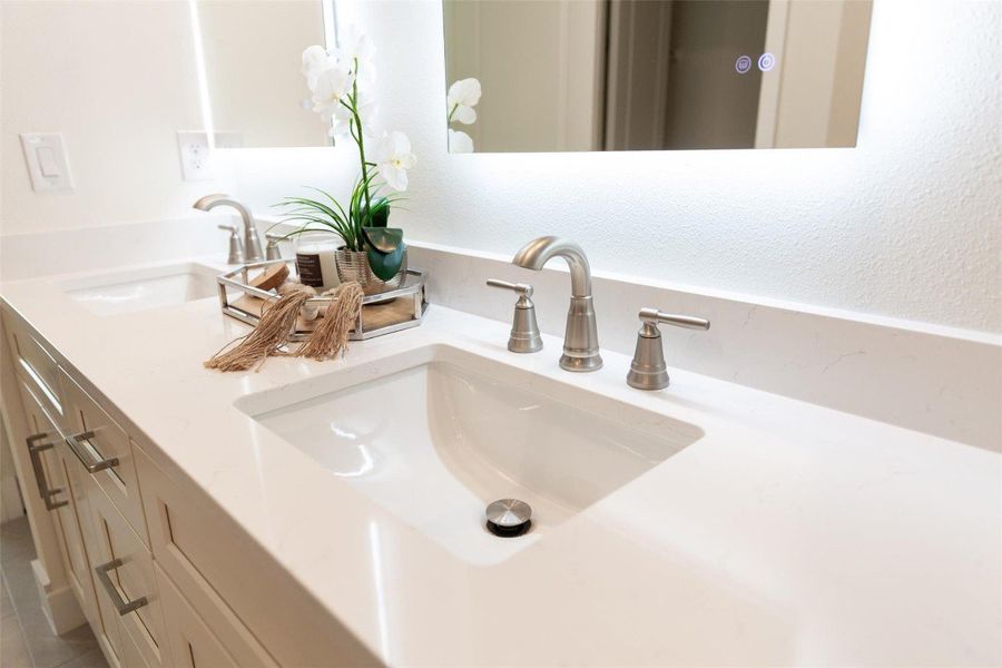Upgraded Moen faucets throughout