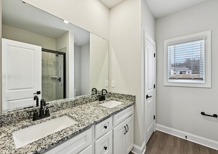 The master bathroom includes this stunning dual-sink vanity! The master bathroom includes this stunning dual-sink vanity!