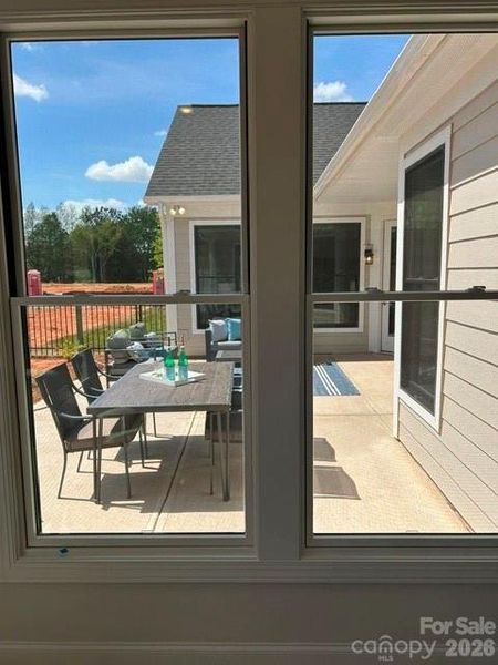 Exterior details and patio area of a home in The Courtyards at Hodges Farm, Charlotte (Image 3).