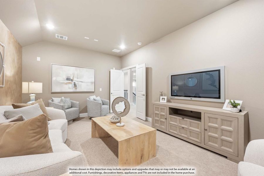 Casual living room with neutral tones, wall-mounted TV, media console, sofa, and accent chairs on carpet.