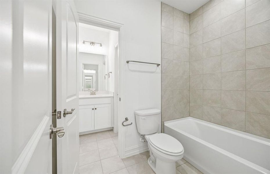 Upgraded secondary bath with elegant finishes