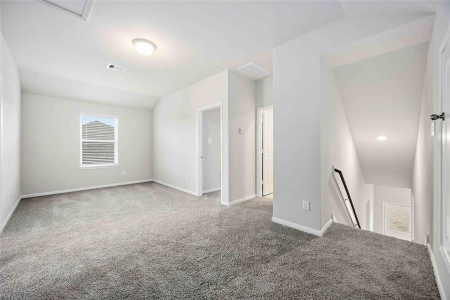 Spacious, unfurnished interior of a new home in Sunterra, Katy (Image 16).