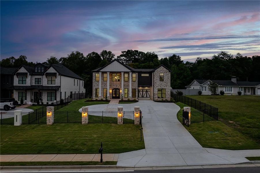 Front exterior of a new home in , Buford, GA, highlighting curb appeal (Image 28). Front exterior of a new home in , Buford, GA, highlighting curb appeal (Image 28).