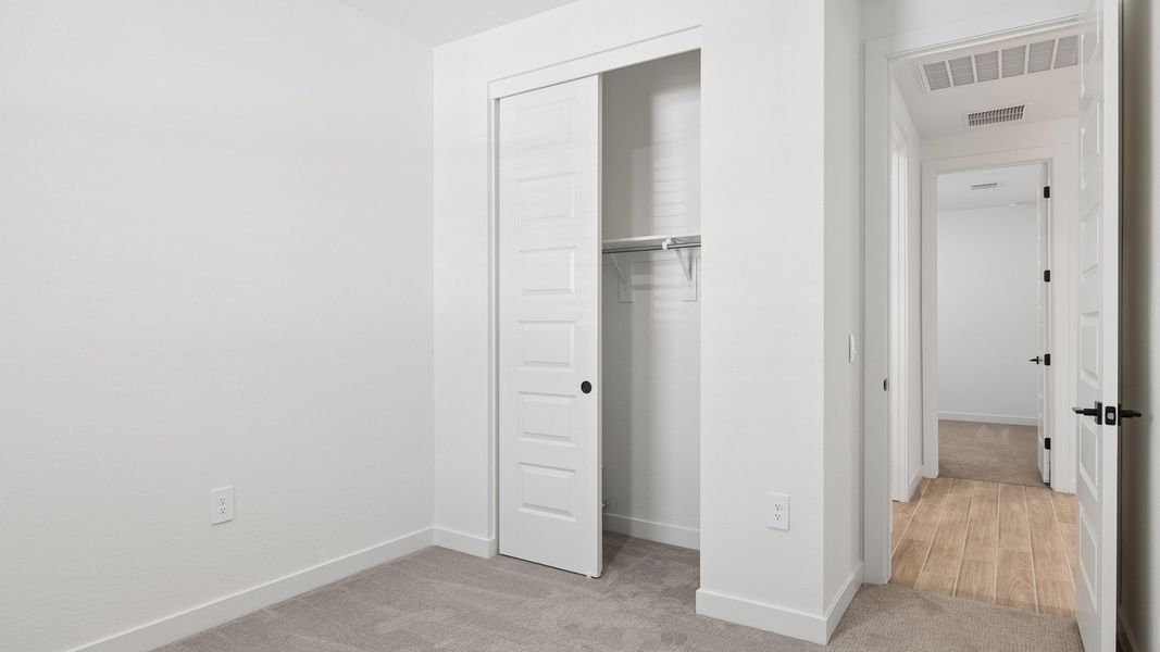 Spacious, unfurnished interior of a new home in The Ridge at Stone Butte, Phoenix (Image 14).