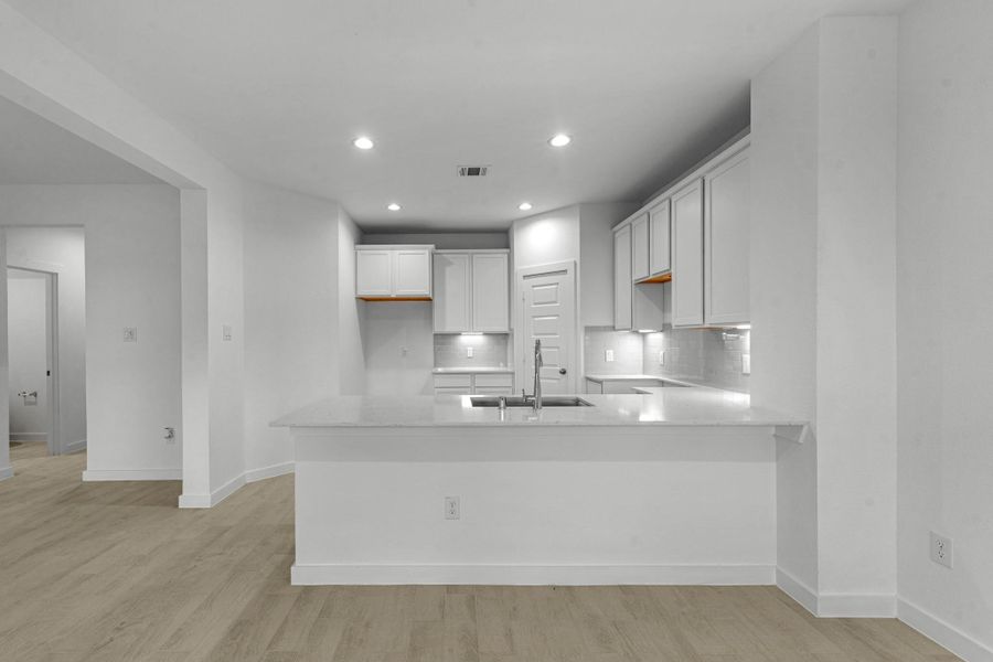 Furnished interior view inside a new home in Cypresswood Landing, Humble (Image 6).